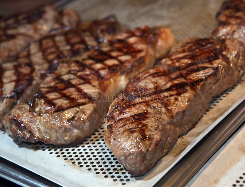 Beef steak cooking stock image. Image of heat, steak 37621463