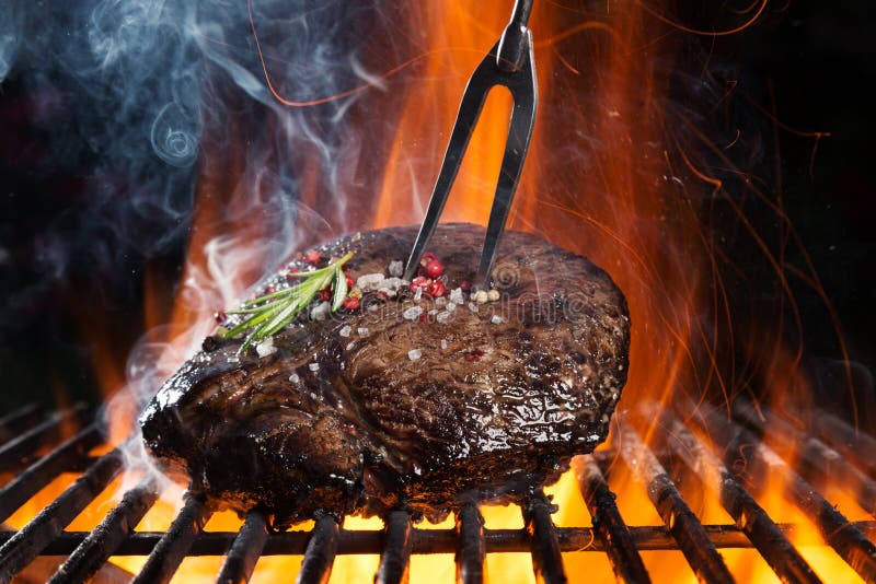 Beef steak on grill stock image. Image of portion, black - 54520849