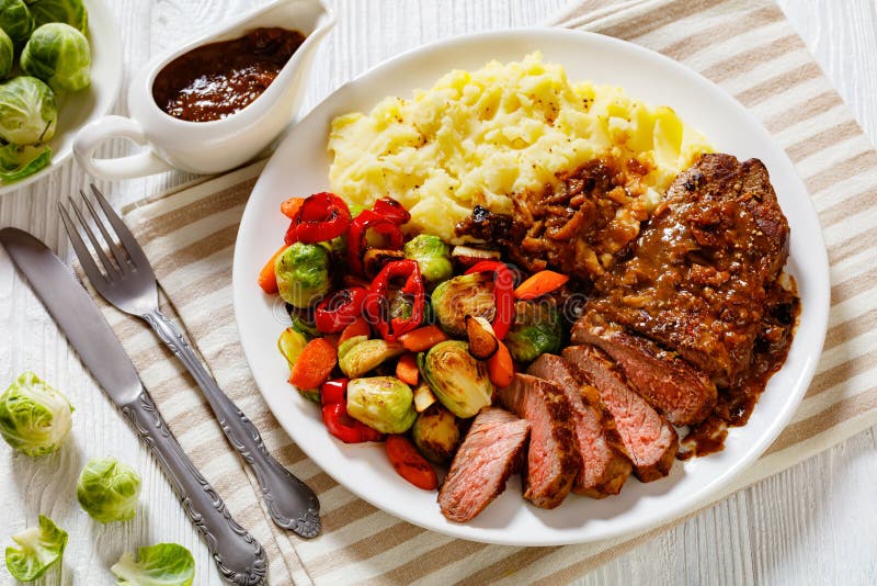 Beef Steak with Potato Mash and Roasted Vegetables Stock Photo - Image