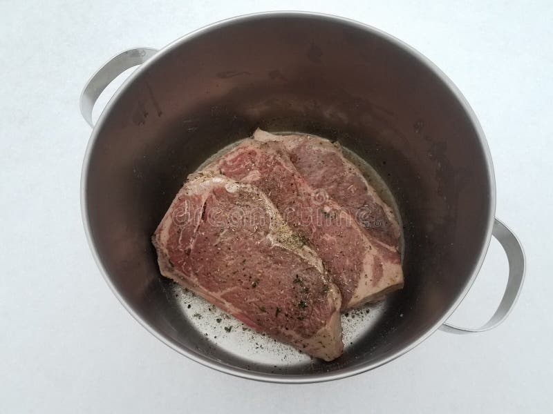 Beef Steak with Seasoning and Liquid in Metal Pot on Snow Stock Photo Image of container, snow