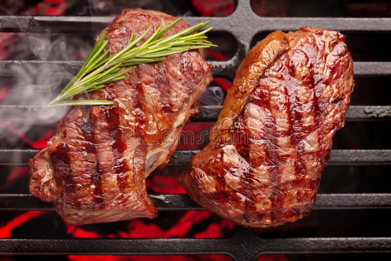 Beef Steaks Cooking on Grill Stock Photo Image of grid, beefsteak