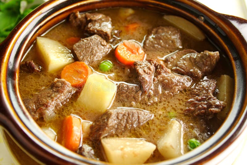 Rich hearty beef stew simmering and ready to serve.