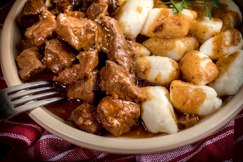 Beef Stew with Potatoes Dumplings. Stock Photo Image of wooden