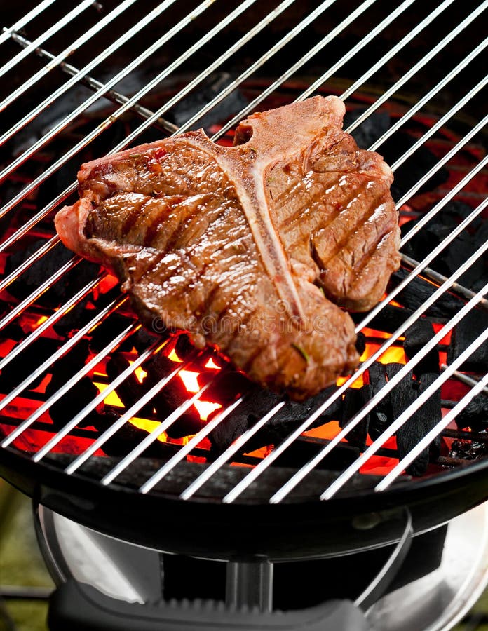 Beef Tbone Steaks on the Grill with Flames. Stock Image Image of