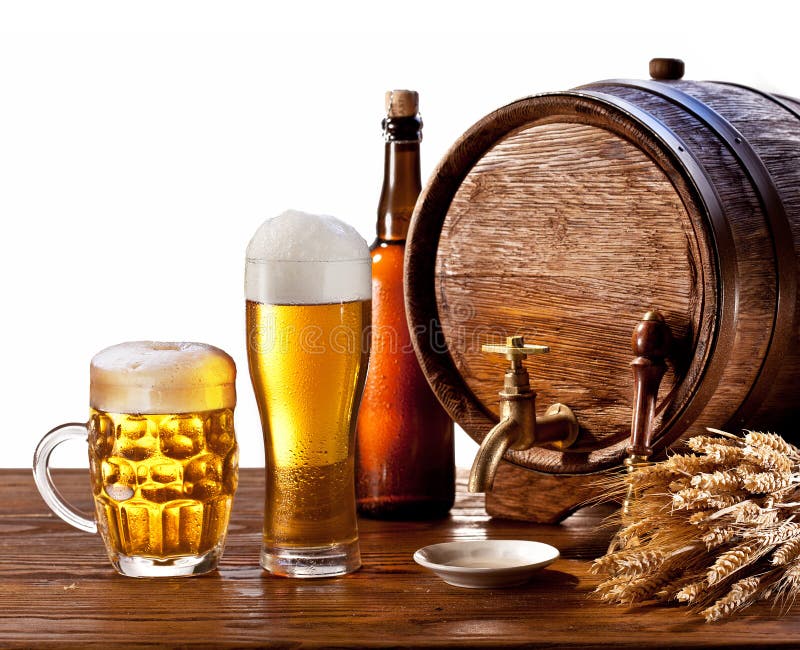 Beer barrel with beer glasses on a wooden table.