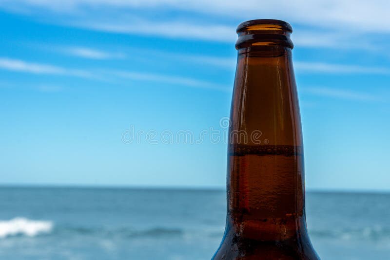 Beer Bottle with Beach in the Background Stock Photo Image of
