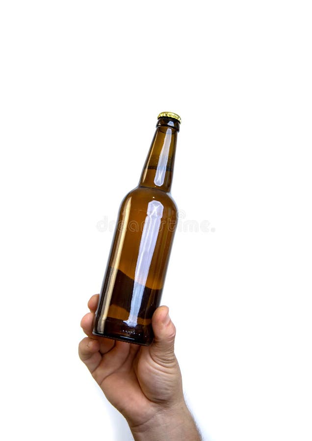 Beer Bottle in Hand Isolated on White. Stock Photo Image of freshness