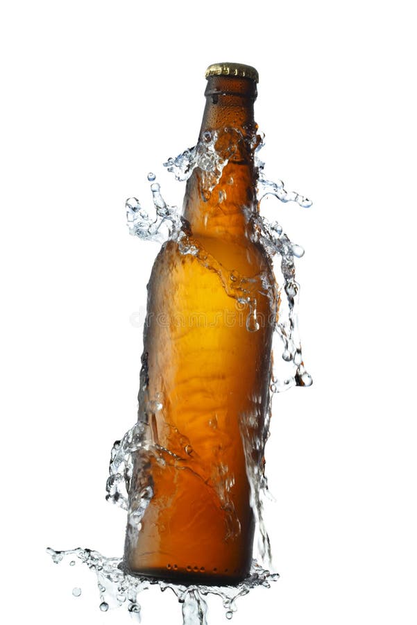 Beer bottle and water splash isolated