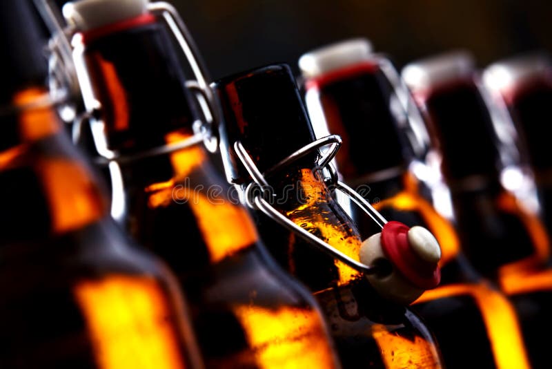 Beer Bottles with Stoppers Glowing in the Dark Stock Photo Image of