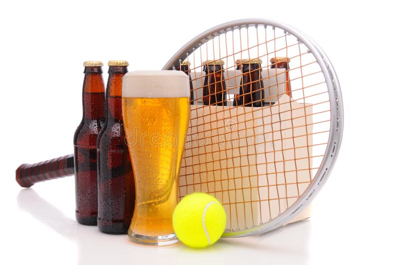 Six pack of beer and frothy glass with a tennis racket and ball in front. Horizontal format isolated on white with reflection. Six pack of beer and frothy glass with a tennis racket and ball in front. Horizontal format isolated on white with reflection.