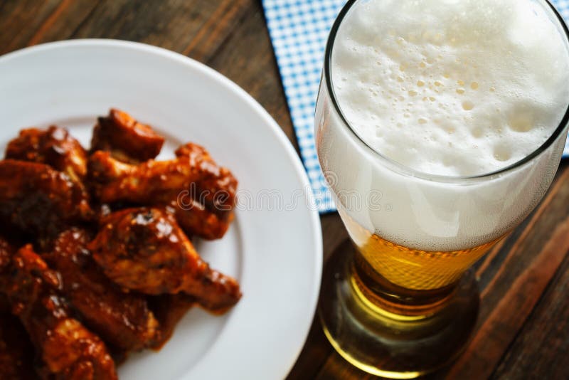 Beer with buffalo wings stock photo. Image of wings, close 51536966