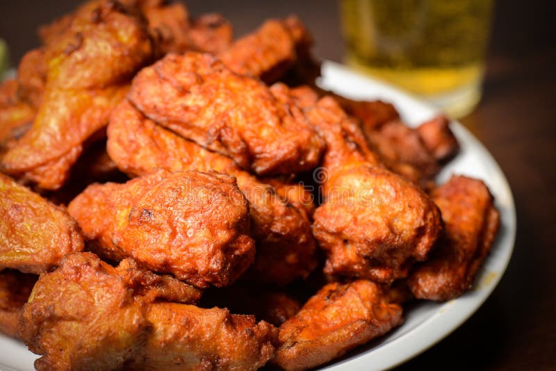 Beer with buffalo wings stock image. Image of beer, froth 51548415