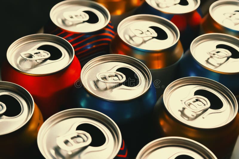 Beer Cans. Aluminum Cans. Closeup of a Lot of Multicolored Open Empty