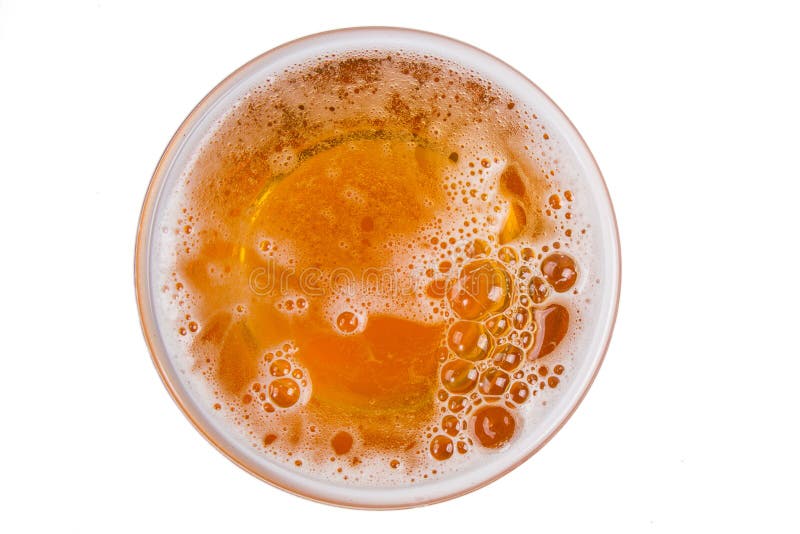 Beer in glass. Beer foam isolated on white background.