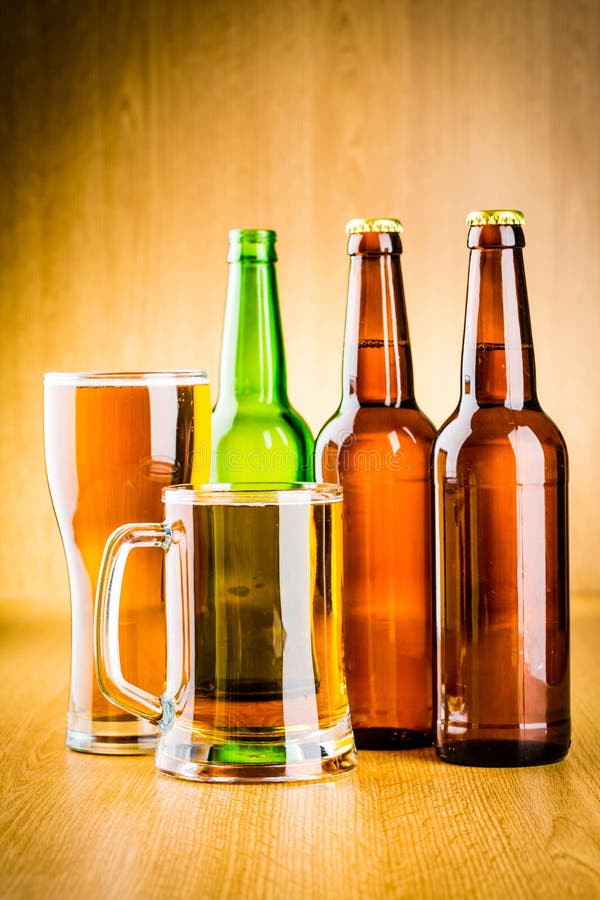 Beer glass and bottle stock image. Image of gold, life 38348303