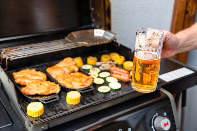 Beer and Grill Barbecue Outdoors on the Backyard. Bbq Party Stock Photo