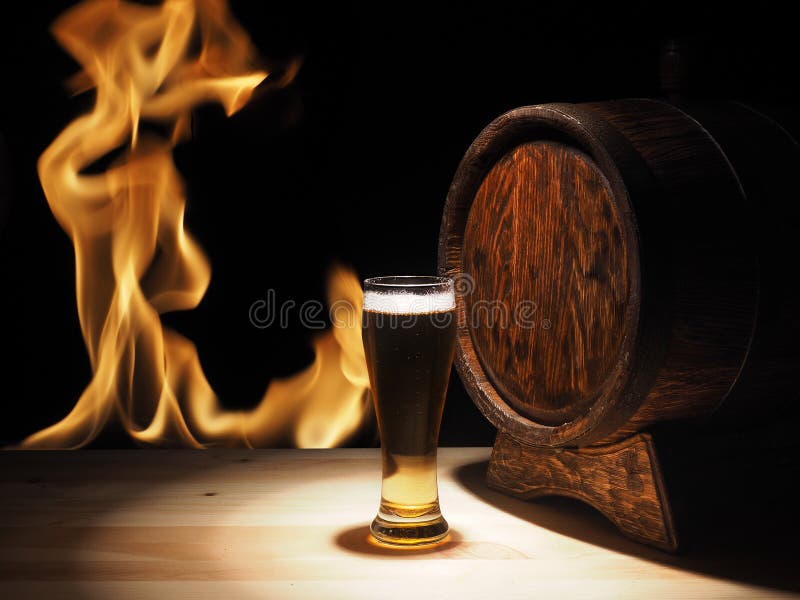 Beer mugs and barrel on a wooden background stock photography Beer mugs and barrel on a wooden background stock photography