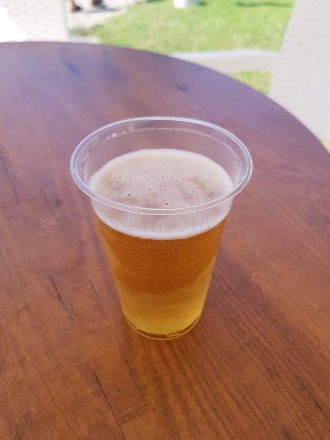 Beer in a plastic cup stock image. Image of pleasure 227941789