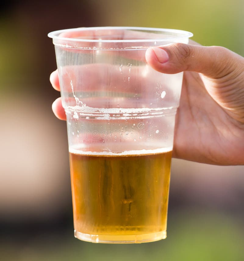 Beer in a Plastic Glass is Drinking a Man Stock Image Image of foam
