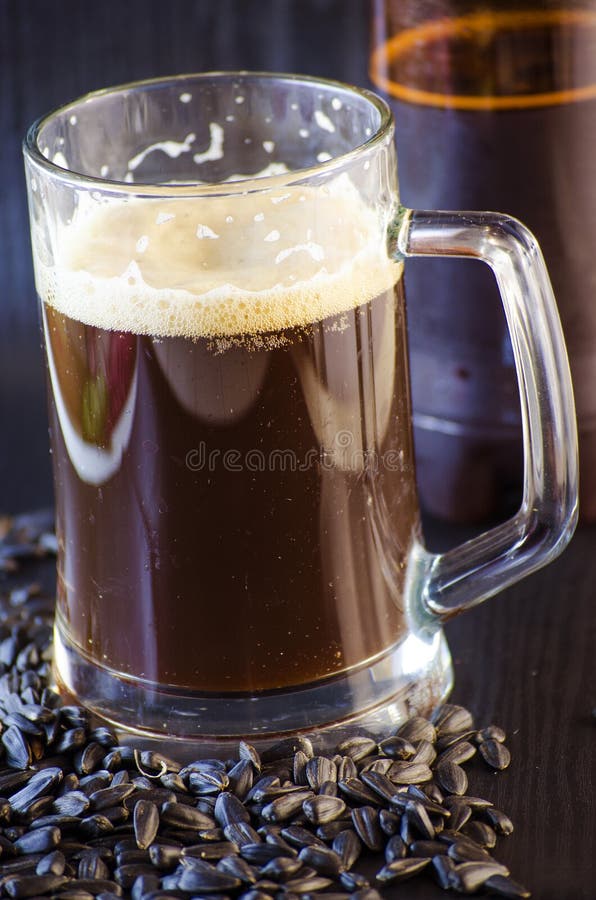 Beer and sunflower seeds stock image. Image of snacks 89905835