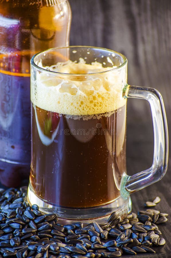 Beer and sunflower seeds stock photo. Image of leisure 89905928