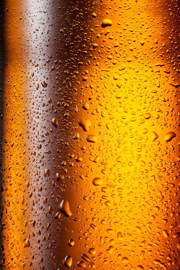 Water Drops Texture on the Bottle of Beer. Stock Photo Image of flow