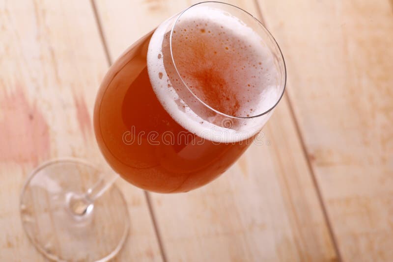 Beer in a wine glass stock photo. Image of table, tasting 77776850