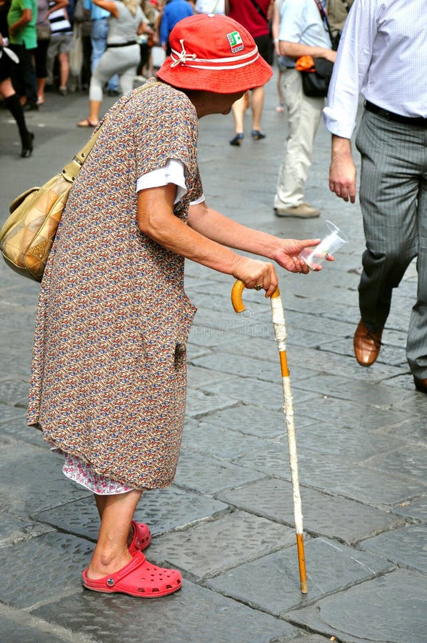 Beggar on the streets of Florence, Italy