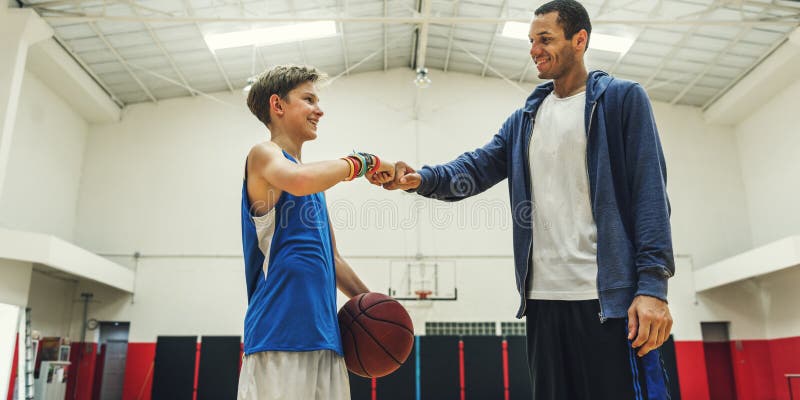 Begrepp för sport för lagledareBoy Athlete Basketball duns royaltyfria foton