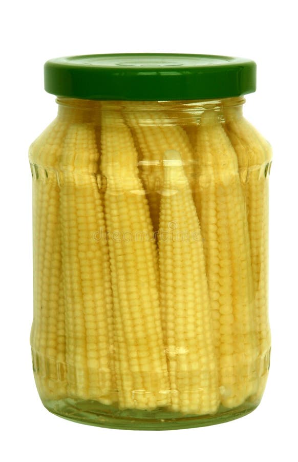 Pickled baby corn cobs in glass bank. Pickled baby corn cobs in glass bank