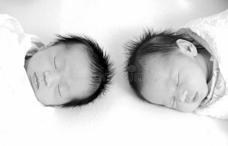 Two twin girls 1 week old (half-asian). Two twin girls 1 week old (half-asian)