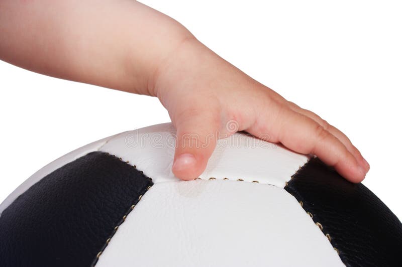 Behandla som ett barn fotboll för bollhandhållen arkivfoto