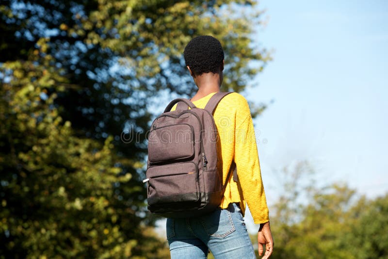 Behind of Young Black Woman Walking in Park with Bag Stock Photo ...