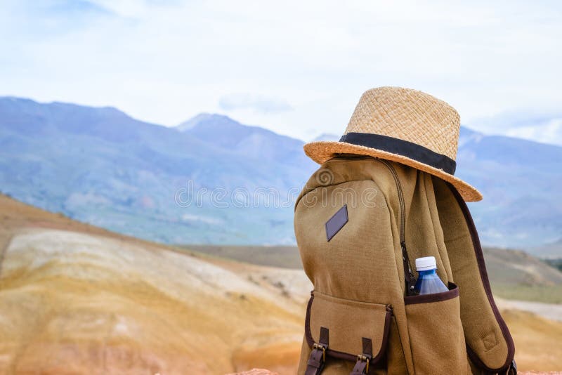 Beige Backpack, Bottle of Water and Straw Hat Stock Photo Image of