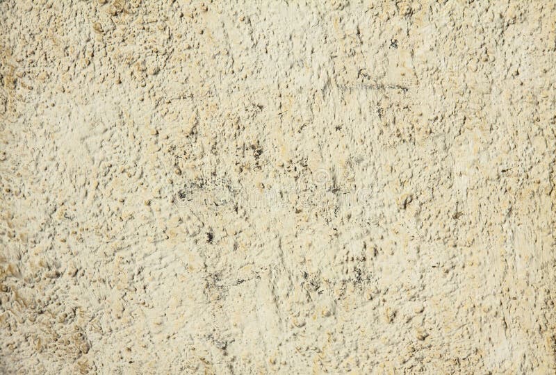 Beige cement plaster wall stock photo. Image of design - 128829940