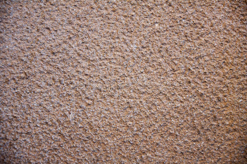 Beige cement plaster wall stock photo