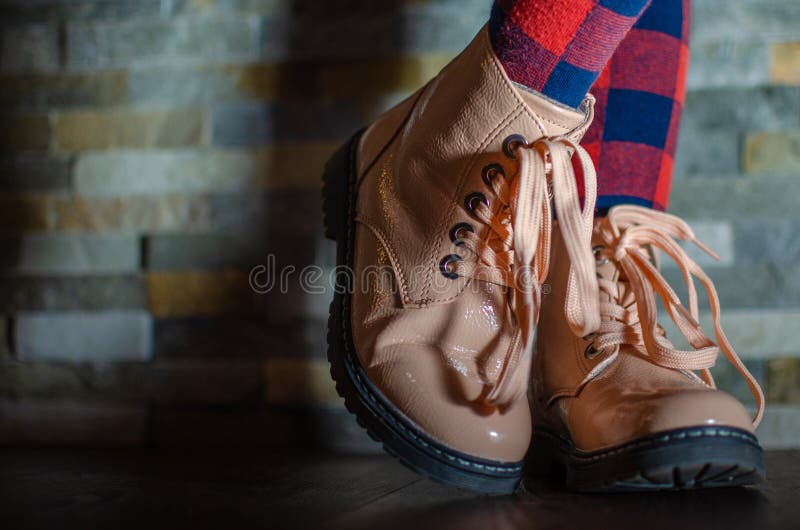 Children Shoes, Against the Background of a Stone Wall Stock Image