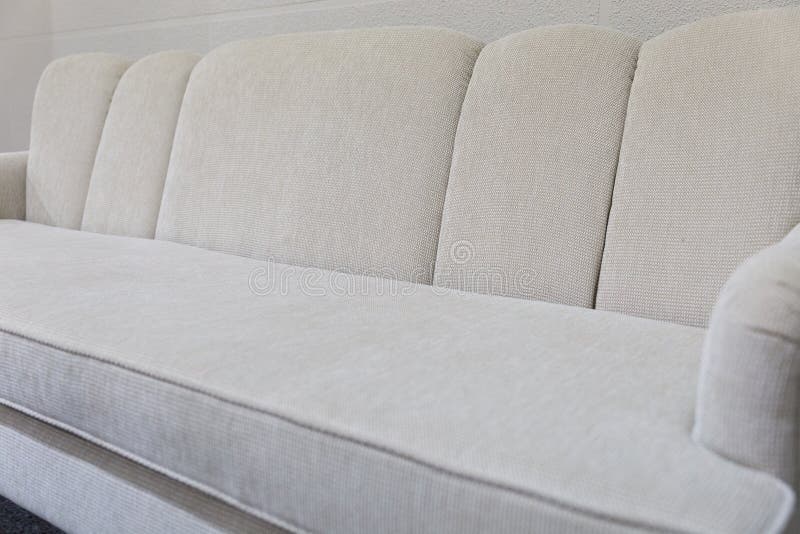 Beige fabric sofa couch stock photo. Image of comfortable 77497490