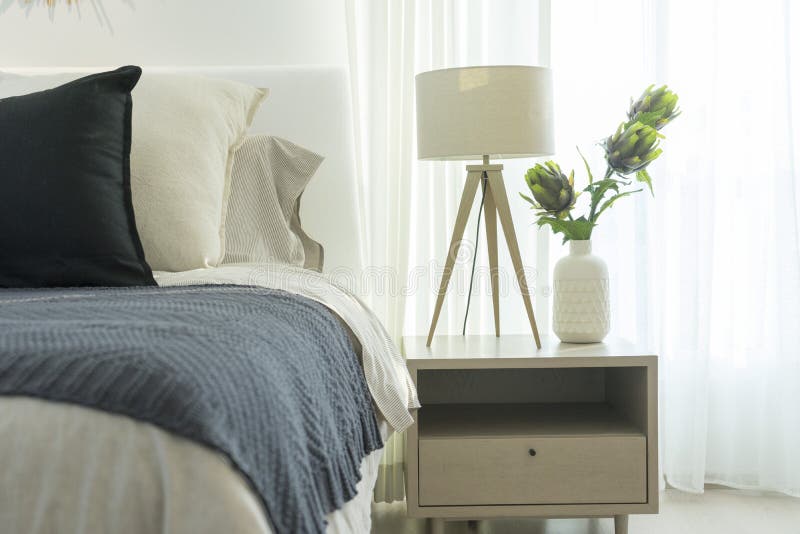 Classic interior design bedroom beige gray and blue, Interior of a bedroom with cushions. Classic interior design bedroom beige gray and blue, Interior of a bedroom with cushions