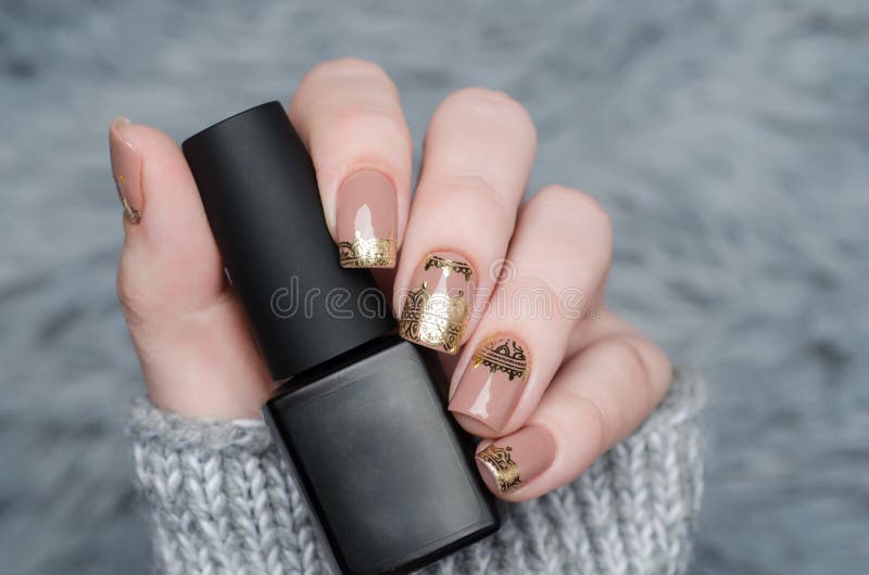 Beige Nude Manicure with Gold Lace Pattern on a Gray Background Stock Image  - Image of foil, glamour: 167400413