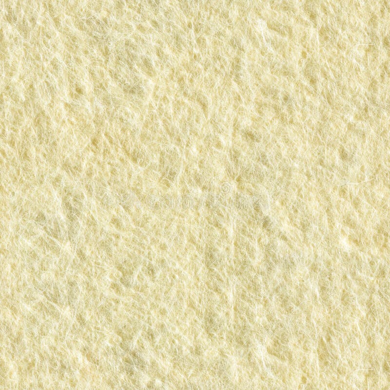 A close up of Yellow felt. Seamless square texture. Tile ready