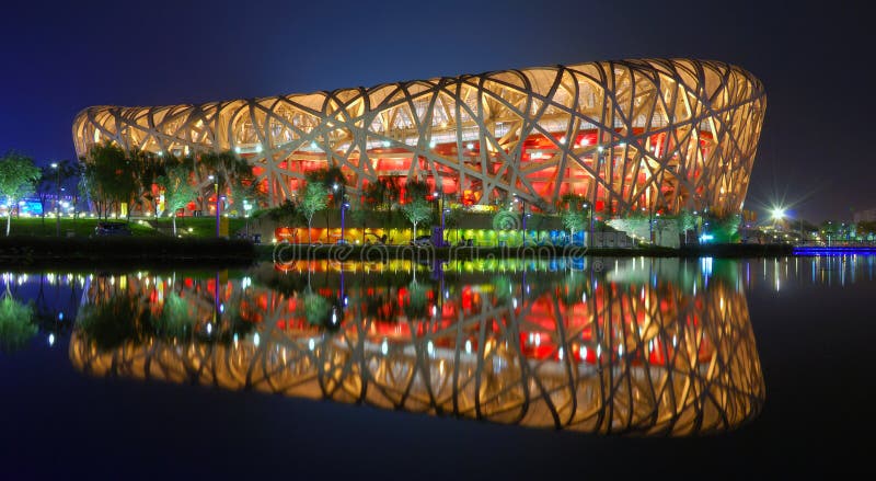 The Beijing National Stadium, also known as the bird's nest will be the main track and field stadium for the 2008 Summer Olympics and will be host to the Opening and Closing ceremonies. In 2002 Government officials engaged architects worldwide in a design competition. Pritzker Prize-winning architects Herzog & de Meuron collaborated with ArupSport and China Architecture Design & Research Group to win the competition. The stadium will seat as many as 100, 000 spectators during the Olympics, but this will be reduced to 80, 000 after the games. It has replaced the original intended venue of the Guangdong Olympic Stadium. The stadium is 330 metres long by 220 metres wide, and is 69.2 metres tall. The 250, 000 square metre (gross floor area) stadium is to be built with 36 km of unwrapped steel, with a combined weight of 45, 000 tonnes. The stadium will cost up to 3.5 billion yuan (422, 873, 850 USD/ 325, 395, 593 EUR). The Beijing National Stadium, also known as the bird's nest will be the main track and field stadium for the 2008 Summer Olympics and will be host to the Opening and Closing ceremonies. In 2002 Government officials engaged architects worldwide in a design competition. Pritzker Prize-winning architects Herzog & de Meuron collaborated with ArupSport and China Architecture Design & Research Group to win the competition. The stadium will seat as many as 100, 000 spectators during the Olympics, but this will be reduced to 80, 000 after the games. It has replaced the original intended venue of the Guangdong Olympic Stadium. The stadium is 330 metres long by 220 metres wide, and is 69.2 metres tall. The 250, 000 square metre (gross floor area) stadium is to be built with 36 km of unwrapped steel, with a combined weight of 45, 000 tonnes. The stadium will cost up to 3.5 billion yuan (422, 873, 850 USD/ 325, 395, 593 EUR).