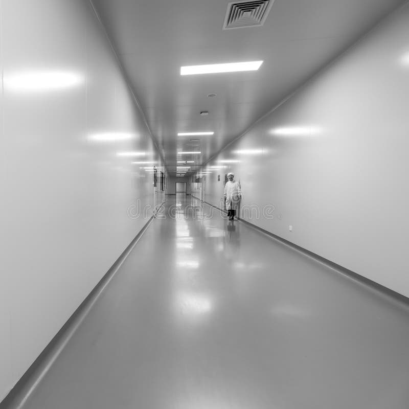 BEIJING, CHINA - JUNE 03, 2019: Tunnel black-white corridor of modern empty hospital. BEIJING, CHINA - JUNE 03, 2019: Tunnel black-white corridor of modern royalty free stock images BEIJING, CHINA - JUNE 03, 2019: Tunnel black-white corridor of modern empty hospital. BEIJING, CHINA - JUNE 03, 2019: Tunnel black-white corridor of modern royalty free stock images