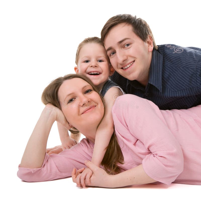 Beiläufiges Portrait der glücklichen jungen Familie lizenzfreies stockfoto