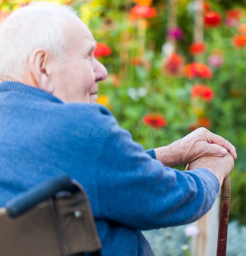 Sad Lonely Senior Elderly Man Wheelchair Aging Stock