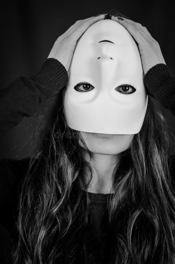 Black And White Masks Upside Down Stock Photo - Download Image Now