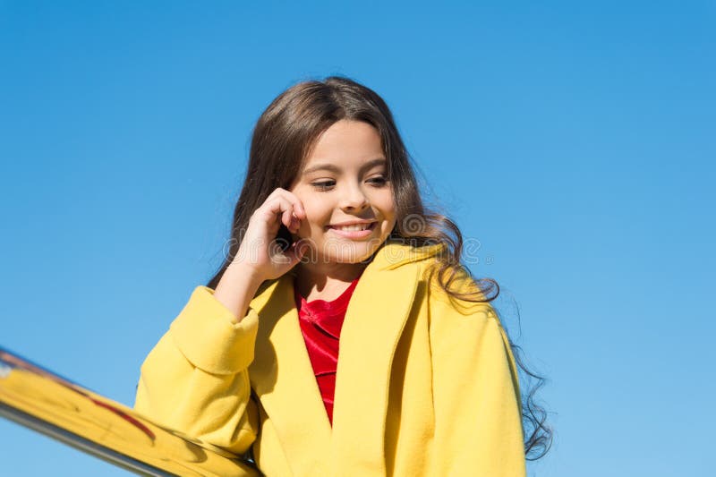 Being proud of her hair. Little child with stylish long brunette hair. Fashion look of hair model. Small girl with royalty free stock photos Being proud of her hair. Little child with stylish long brunette hair. Fashion look of hair model. Small girl with royalty free stock photos