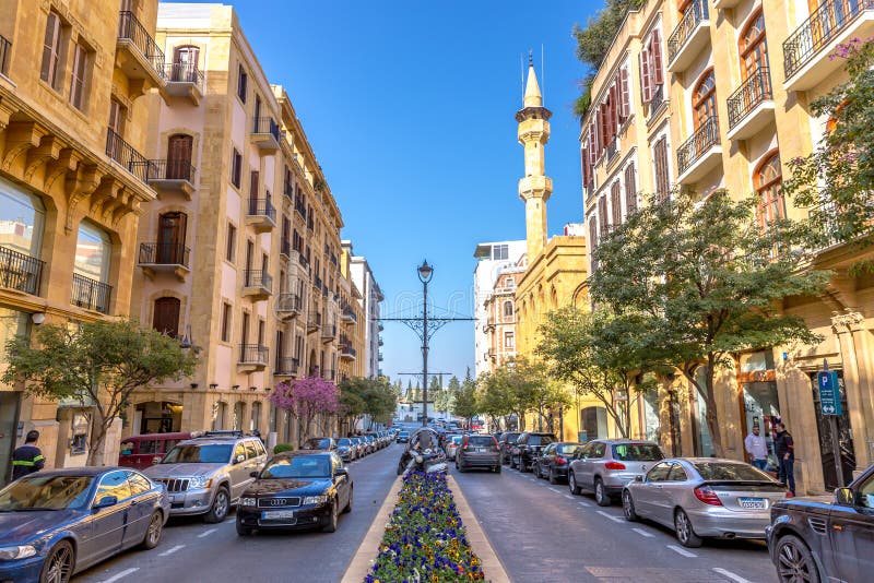 Beirut, Lebanon - Feb 5th 2018 - Amazing very modern area in Beirut downtown, cars, flowers, mosque in the background, french desi