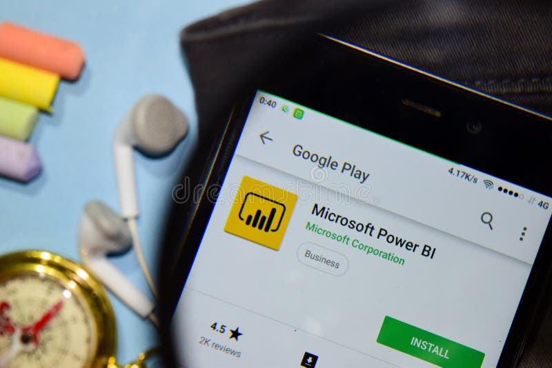 Microsoft Power BI dev app with magnifying on Smartphone screen