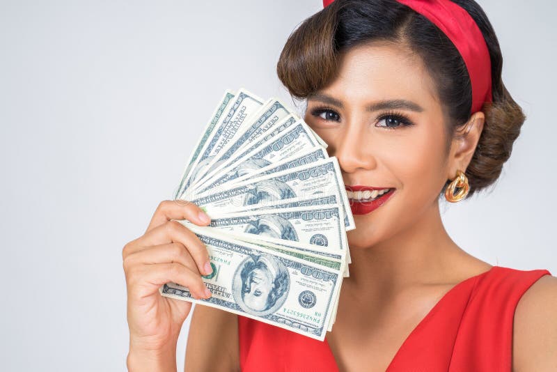 Bel argent du dollar de participation de main de femme de mode heureuse image stock
